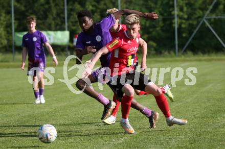 Fussball Kaerntner Liga. SK Austria Klagenfurt gegen Spittal.  Mersei Dieu Nsandi (Austria Klagenfurt),  Adrian Steurer (Spittal). Brueckl, am 27.5.2023.
Foto: Kuess



---
pressefotos, pressefotografie, kuess, qs, qspictures, sport, bild, bilder, bilddatenbank