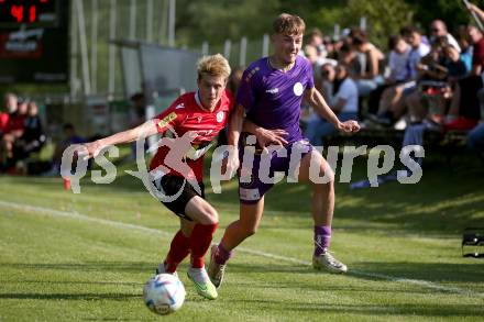 Fussball Kaerntner Liga. SK Austria Klagenfurt gegen Spittal. Dennis Meschnik (Austria Klagenfurt), Tristan Bruekk (Spittal). Brueckl, am 27.5.2023.
Foto: Kuess



---
pressefotos, pressefotografie, kuess, qs, qspictures, sport, bild, bilder, bilddatenbank