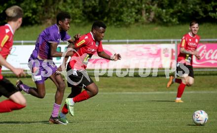 Fussball Kaerntner Liga. SK Austria Klagenfurt gegen Spittal.  Mersei Dieu Nsandi (Austria Klagenfurt), Rashidi Mohamed Udikaluka (Spittal). Brueckl, am 27.5.2023.
Foto: Kuess



---
pressefotos, pressefotografie, kuess, qs, qspictures, sport, bild, bilder, bilddatenbank