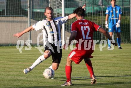 Fussball Kaerntner Liga. Bleiburg gegen KAC.  Patrick Paul Oswaldi  (Bleiburg),   Maximilian Blaschitz  (KAC). Bleiburg, am 12.8.2023.
Foto: Kuess
---
pressefotos, pressefotografie, kuess, qs, qspictures, sport, bild, bilder, bilddatenbank