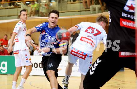 Handball BUndesliga. SC Ferlach gegen HC FIVERS WAT Margareten.  Mladan Jovanovic,  (SCF),   Jakob Nigg (Margareten). Ferlach, am 5.9.2023.
Foto: Kuess
---
pressefotos, pressefotografie, kuess, qs, qspictures, sport, bild, bilder, bilddatenbank