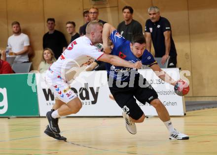 Handball BUndesliga. SC Ferlach gegen HC FIVERS WAT Margareten.  Jure Kocbek, (SCF),     Lukas Gangel (Margareten). Ferlach, am 5.9.2023.
Foto: Kuess
---
pressefotos, pressefotografie, kuess, qs, qspictures, sport, bild, bilder, bilddatenbank