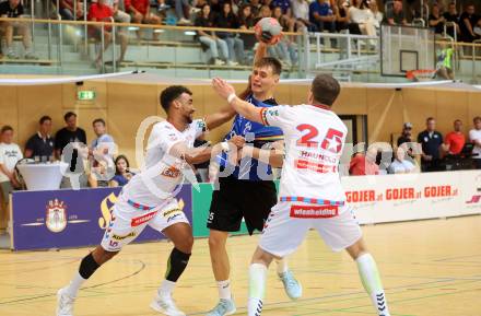 Handball BUndesliga. SC Ferlach gegen HC FIVERS WAT Margareten.  Jura Egon Juranic, (SCF),  Eric Damboeck, Marc-Andre Haunold   (Margareten). Ferlach, am 5.9.2023.
Foto: Kuess
---
pressefotos, pressefotografie, kuess, qs, qspictures, sport, bild, bilder, bilddatenbank
