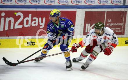 EBEL. Eishockey Bundesliga. EC VSV gegen HCB Suedtirol Alperia.  John Hughes,   (VSV),    Enrico Miglioranzi  (Bozen). Villach, am 19.9.2023
Foto: Kuess
www.qspictures.net
---
pressefotos, pressefotografie, kuess, qs, qspictures, sport, bild, bilder, bilddatenbank