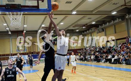 Basketball 2. Liga 2023/2024. Grunddurchgang 6. Runde.  KOS Celovec gegen Woerthersee Piraten.. Simon Siencnik  (KOS),  Marcus Holyfield  (Piraten). Klagenfurt, am 11.11.2023.
Foto: Kuess
www.qspictures.net
---
pressefotos, pressefotografie, kuess, qs, qspictures, sport, bild, bilder, bilddatenbank
