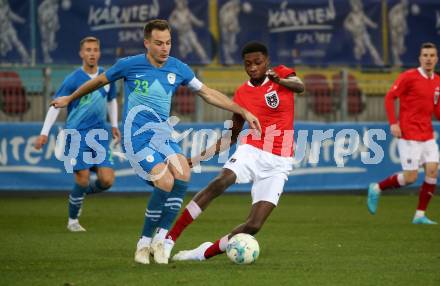 Fussball Laenderspiel Amateure. Oesterreich gegen Slowenien.  Mersei Dieu Nsandi,  (AUT),   Nejc Doplihar (SLO). Klagenfurt, am 26.11.2023.
Foto: Kuess
www.qspictures.net
---
pressefotos, pressefotografie, kuess, qs, qspictures, sport, bild, bilder, bilddatenbank