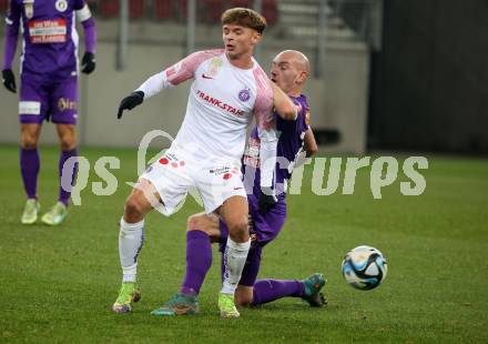 Fussball Bundesliga. SK Austria Klagenfurt gegen FK Austria Wien.  Nicolas Wimmer,   (Klagenfurt), Muharem Huskovic    (Wien).  Klagenfurt, am 9.12.2023.
Foto: Kuess
---
pressefotos, pressefotografie, kuess, qs, qspictures, sport, bild, bilder, bilddatenbank