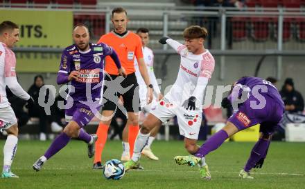Fussball. Bundesliga. SK Austria Klagenfurt gegen Austria Wien.  Rico Benatelli   (Austria Klagenfurt),   Muharem Huskovic   (Wien). Klagenfurt, 9.12.2023.
Foto: Kuess
---
pressefotos, pressefotografie, kuess, qs, qspictures, sport, bild, bilder, bilddatenbank