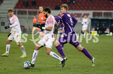 Fussball. Bundesliga. SK Austria Klagenfurt gegen Austria Wien.  Nicolas Binder   (Austria Klagenfurt),  Lucas Galvao Da Costa Souza    (Wien). Klagenfurt, 9.12.2023.
Foto: Kuess
---
pressefotos, pressefotografie, kuess, qs, qspictures, sport, bild, bilder, bilddatenbank
