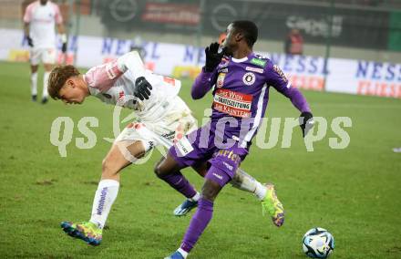 Fussball. Bundesliga. SK Austria Klagenfurt gegen Austria Wien.  Solomon Bonnah   (Austria Klagenfurt), Muharem Huskovic     (Wien). Klagenfurt, 9.12.2023.
Foto: Kuess
---
pressefotos, pressefotografie, kuess, qs, qspictures, sport, bild, bilder, bilddatenbank