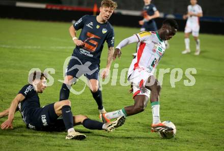 Fussball Regionalliga. WAC Amateure gegen Wallern.  Sankara William Karamoko  (WAC),  
Jakob Karlinger  (Wallern).
Wolfsberg, am 22.3.2024.
Foto: Kuess
www.qspictures.net
---
pressefotos, pressefotografie, kuess, qs, qspictures, sport, bild, bilder, bilddatenbank