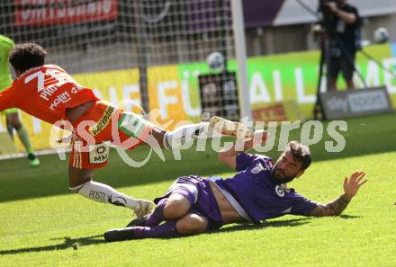 Fussball Bundesliga. SK Austria Klagenfurt gegen TSV Egger Glas Hartberg. Kosmas Gkezos  (Klagenfurt), Ruben Fritzner Providence  (Hartberg).  Klagenfurt, am 7.4.2024.
Foto: Kuess
www.qspictures.net
---
pressefotos, pressefotografie, kuess, qs, qspictures, sport, bild, bilder, bilddatenbank