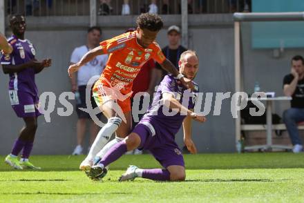 Fussball Bundesliga. SK Austria Klagenfurt gegen TSV Egger Glas Hartberg.  Rico Benatelli (Klagenfurt), Ruben Fritzner Providence  (Hartberg).  Klagenfurt, am 7.4.2024.
Foto: Kuess
www.qspictures.net
---
pressefotos, pressefotografie, kuess, qs, qspictures, sport, bild, bilder, bilddatenbank