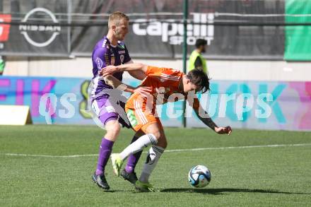 Fussball Bundesliga. SK Austria Klagenfurt gegen TSV Egger Glas Hartberg.  Christopher CVetko (Klagenfurt),  Dominik Prokop (Hartberg).  Klagenfurt, am 7.4.2024.
Foto: Kuess
www.qspictures.net
---
pressefotos, pressefotografie, kuess, qs, qspictures, sport, bild, bilder, bilddatenbank