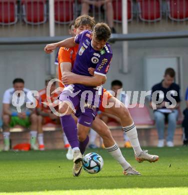 Fussball Bundesliga. SK Austria Klagenfurt gegen TSV Egger Glas Hartberg.  Christopher Wernitznig,  (Klagenfurt),  Julian Halwachs (Hartberg).  Klagenfurt, am 7.4.2024.
Foto: Kuess
www.qspictures.net
---
pressefotos, pressefotografie, kuess, qs, qspictures, sport, bild, bilder, bilddatenbank