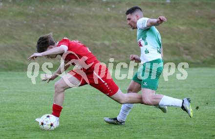 Fussball Unterliga Ost. Feldkirchen SV gegen Sirnitz. Tim Oman  (Feldkirchen),  Tim Kandut (Sirnitz). Feldkirchen, am 13.4.2024.
Foto: Kuess
www.qspictures.net
---
pressefotos, pressefotografie, kuess, qs, qspictures, sport, bild, bilder, bilddatenbank