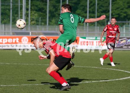 Fussball. Kaerntner Liga. Landskron gegen ATUS Ferlach.  Philipp Gatti (Landskron), Martin Posratschnig  (Ferlach). Landskron, am 29.5.2024.
Foto: Kuess
www.qspictures.net
---
pressefotos, pressefotografie, kuess, qs, qspictures, sport, bild, bilder, bilddatenbank