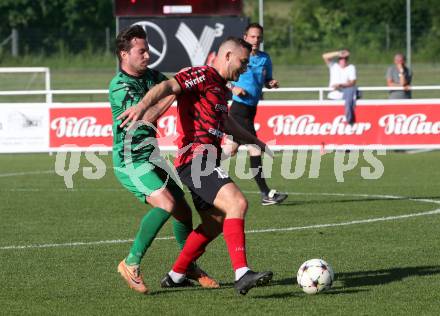 Fussball. Kaerntner Liga. Landskron gegen ATUS Ferlach.  Daniel Arneitz (Landskron),  Martin Posratschnig (Ferlach). Landskron, am 29.5.2024.
Foto: Kuess
www.qspictures.net
---
pressefotos, pressefotografie, kuess, qs, qspictures, sport, bild, bilder, bilddatenbank