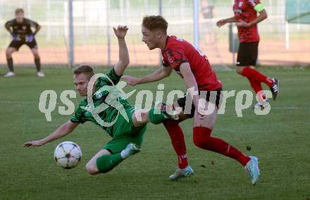 Fussball. Kaerntner Liga. Landskron gegen ATUS Ferlach. Markus Ulbing  (Landskron),  Jano Maria Candussi (Ferlach). Landskron, am 29.5.2024.
Foto: Kuess
www.qspictures.net
---
pressefotos, pressefotografie, kuess, qs, qspictures, sport, bild, bilder, bilddatenbank