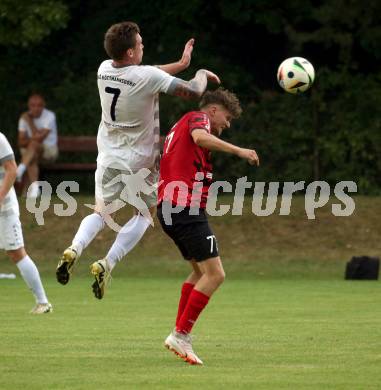 Fussball Kaerntner Liga. ATUS Ferlach gegen Koettmannsdorf.  Stefan Ebner (Ferlach), Ziga Erzen  (Koettmannsdorf). Ferlach, 14.8.2024.
Foto: Kuess
www.qspictures.net
---
pressefotos, pressefotografie, kuess, qs, qspictures, sport, bild, bilder, bilddatenbank