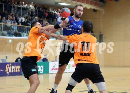 Handball Bundesliga. SC Ferlach gegen HSG Holding Graz.    Leban Patrik (Ferlach),   Belos Nemanja, Albek Joszef (Graz).  Ferlach, am 23.11.2024.
Foto: Kuess
www.qspictures.net
---
pressefotos, pressefotografie, kuess, qs, qspictures, sport, bild, bilder, bilddatenbank