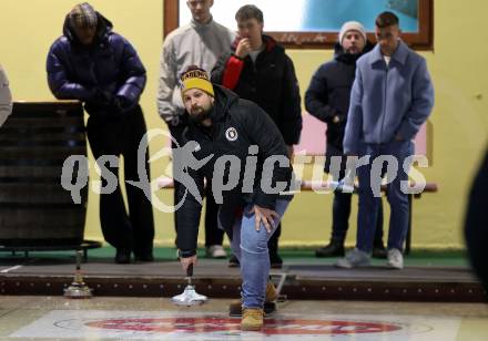Fussball Bundesliga. Stockschiessen. SK  Austria Klagenfurt. Patrick Hofferer.  Launsdorf,  am 11.12.2024.
Foto: Kuess
www.qspictures.net
---
pressefotos, pressefotografie, kuess, qs, qspictures, sport, bild, bilder, bilddatenbank