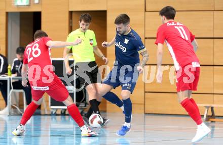 Futsal Bundesliga. Futsal Klagenfurt Versli.at gegen Stella Rossa. Igor Kondic (Klagenfurt), Robert Bencun (Stella Rossa). Viktring, am 4.1.2025.
Foto: Kuess
---
pressefotos, pressefotografie, kuess, qs, qspictures, sport, bild, bilder, bilddatenbank
