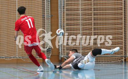 Futsal Bundesliga. Futsal Klagenfurt Versli.at gegen Stella Rossa. Vladimir Kajkut  (Klagenfurt), Alec Floegel  (Stella Rossa). Viktring, am 4.1.2025.
Foto: Kuess
---
pressefotos, pressefotografie, kuess, qs, qspictures, sport, bild, bilder, bilddatenbank