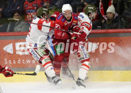 Eishockey ICE Bundesliga. KAC gegen HCB SÃ¼dtirol Alperia.  Thomas Hundertpfund (KAC),  Giordano Finoro, Scott Valentine (Bozen). Klagenfurt, am 12.1.2025
Foto: Kuess
---
pressefotos, pressefotografie, kuess, qs, qspictures, sport, bild, bilder, bilddatenbank