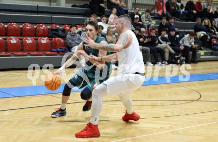 Basketball 2. Liga 2024/2025. Grunddurchgang 17. Runde.  KOS Celovec gegen Dornbirn Lions.   Nikolas Susa (KOS Celovec), Pauls Miglinieks   (Dornbirn Lions). Klagenfurt, am 1.2.2025.
Foto: Kuess


---
pressefotos, pressefotografie, kuess, qs, qspictures, sport, bild, bilder, bilddatenbank