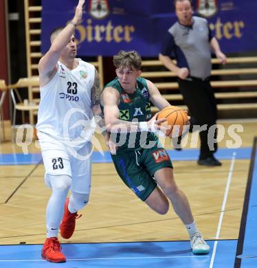 Basketball 2. Liga 2024/2025. Grunddurchgang 17. Runde.  KOS Celovec gegen Dornbirn Lions.   Nikolas Susa (KOS Celovec),  Davids Grinbergs  (Dornbirn Lions). Klagenfurt, am 1.2.2025.
Foto: Kuess


---
pressefotos, pressefotografie, kuess, qs, qspictures, sport, bild, bilder, bilddatenbank