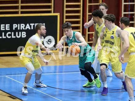 Basketball 2. Liga 2024/2025. Grunddurchgang 20. Runde.  Woerthersee Piraten gegen KOS.    Tim Huber, (Piraten),  Simon Siencnik  (KOS). Klagenfurt, am 22.2.2025.
Foto: Kuess


---
pressefotos, pressefotografie, kuess, qs, qspictures, sport, bild, bilder, bilddatenbank