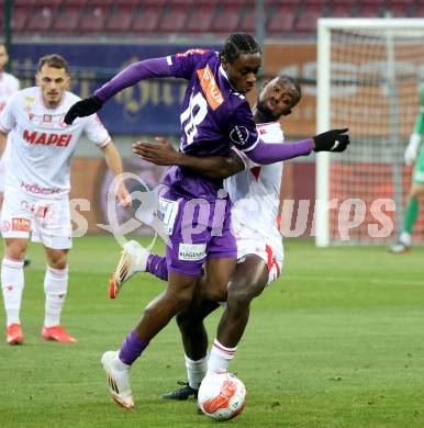 Fussball Bundesliga. SK Austria Klagenfurt gegen GAK. Dikeni Salifou  (Klagenfurt), Sadik Fofana  (GAK). Klagenfurt, am 22.2.2025.
Foto: Kuess
---
pressefotos, pressefotografie, kuess, qs, qspictures, sport, bild, bilder, bilddatenbank