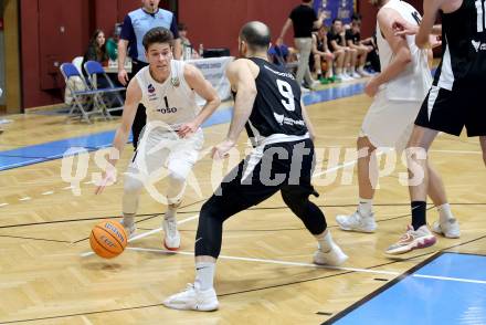 Basketball 2. Liga 2024/2025. Grunddurchgang 22. Runde.   KOS Celovec gegen RAIDERS Tirol.   Simon Siencnik (KOS),  Emmanouil Bechrakis  (Tirol). Klagenfurt, am 8.3.2025.
Foto: Kuess


---
pressefotos, pressefotografie, kuess, qs, qspictures, sport, bild, bilder, bilddatenbank