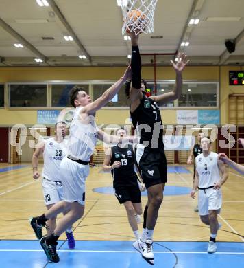 Basketball 2. Liga 2024/2025. Grunddurchgang 22. Runde.   KOS Celovec gegen RAIDERS Tirol.   Lorenz Windisch (KOS),  Steven Kaltenbrunner  (Tirol). Klagenfurt, am 8.3.2025.
Foto: Kuess


---
pressefotos, pressefotografie, kuess, qs, qspictures, sport, bild, bilder, bilddatenbank