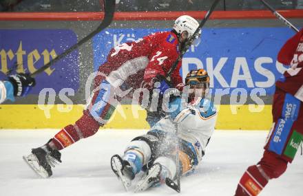 Eishockey ICE Bundesliga. KAC gegen Linz. Steven Strong    (KAC), Julian Pusnik  (Linz). Klagenfurt, am 23.3.2025
Foto: Kuess
---
pressefotos, pressefotografie, kuess, qs, qspictures, sport, bild, bilder, bilddatenbank