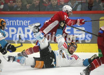 Eishockey ICE Bundesliga. KAC gegen Linz. Steven Strong (KAC), Julian Pusnik  (Linz). Klagenfurt, am 23.3.2025
Foto: Kuess
---
pressefotos, pressefotografie, kuess, qs, qspictures, sport, bild, bilder, bilddatenbank