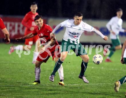 Fussball Kaerntner Liga. KAC gegen Voelkermarkt.  Peter Pucker (KAC),  Robert Matic  (Voelkermarkt).  Klagenfurt, am 28.3.2024.
Foto: Kuess
---
pressefotos, pressefotografie, kuess, qs, qspictures, sport, bild, bilder, bilddatenbank