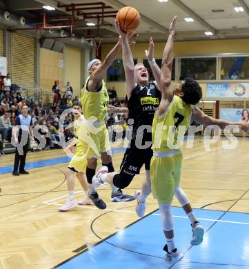 Basketball 2. Liga 2024/2025. Playoffs. VF3.   Woerthersee Piraten gegen Mattersburg Rocks.    Shawn L. Ray, Marcus Holyfield (Piraten),   Asdren Drew Koka (Mattersburg Rocks). Klagenfurt, am 29.3.2025.
Foto: Kuess


---
pressefotos, pressefotografie, kuess, qs, qspictures, sport, bild, bilder, bilddatenbank