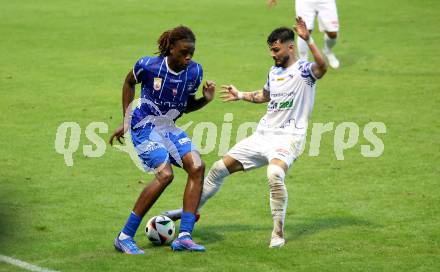 Fussball OEFB Cup. Treibach gegen Blau Weiss Linz.  Nikolaos Kokkas  (Treibach),  Elias Bakatukanda  (BW Linz). Treibach, am 25.7.2025.
Foto: Kuess
www.qspictures.net
---
pressefotos, pressefotografie, kuess, qs, qspictures, sport, bild, bilder, bilddatenbank