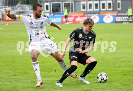 Fussball Bundesliga. Wolfsberger AC  gegen SCR Altach.  Markus Pink (Wolfsberg),  Paul-Friedrich Koller  (Altach). Wolfsberg, am 2.8..2025.
Foto: Kuess
www.qspictures.net
---
pressefotos, pressefotografie, kuess, qs, qspictures, sport, bild, bilder, bilddatenbank