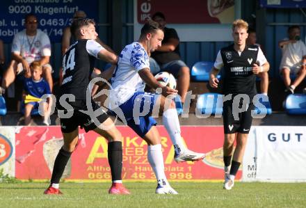 Fussball Regionalliga Mitte.  Treibach gegen Voitsberg.  Vahid Muharemovic (Treibach),  Andrej Stevanovic   (Voitsberg).  Treibach, am 15.8.2025.
Foto. Kuess
www.qspictures.net
---
pressefotos, pressefotografie, kuess, qs, qspictures, sport, bild, bilder, bilddatenbank
