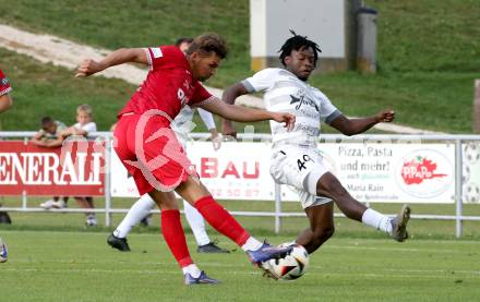 Fussball Kaerntner Liga.  Koettmannsdorf gegen SAK.   Confidence Eboigbe Osawe (Koettmannsdorf),   Luka Gajic  (SAK).  Klagenfurt, am 17.8.2025.
Foto. Kuess
www.qspictures.net
---
pressefotos, pressefotografie, kuess, qs, qspictures, sport, bild, bilder, bilddatenbank