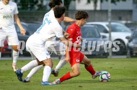 Fussball KÃ¤rntner Liga. SAK gegen St. Veit.   Jakob Elija Sturm (SAK),  Julian Hufnagl (St.Veit). Klagenfurt, am 19.9.2025.
Foto: Kuess
www.qspictures.net
---
pressefotos, pressefotografie, kuess, qs, qspictures, sport, bild, bilder, bilddatenbank