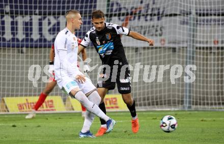 Fussball 2. Liga. SK Austria Klagenfurt gegen FC Hertha Wels. Bartol Barisic  (Klagenfurt), Luca Tischler  (Wels).  Klagenfurt, 26.9.2025.
Foto: Kuess
www.qspictures.net
---
pressefotos, pressefotografie, kuess, qs, qspictures, sport, bild, bilder, bilddatenbank