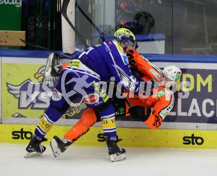 Eishockey Bundesliga. EC IDM Waermepumpen VSV gegen Moser Medical Graz99ers.  Steven Strong (VSV),  Nick Swaney (Graz). . Villach, am 17.10..2025.
Foto: Kuess
www.qspictures.net
---
pressefotos, pressefotografie, kuess, qs, qspictures, sport, bild, bilder, bilddatenbank