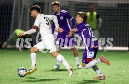 Fussball. Kaerntner Liga. SK Austria Klagenfurt Amateure gegen Matrei .  Sebastian Pschernig  (Austria Klagenfurt),  Jonathan Panzl  (Matrei).  Koettmannsdorf, 25.10.2025.
Foto: Kuess
www.qspictures.net
---
pressefotos, pressefotografie, kuess, qs, qspictures, sport, bild, bilder, bilddatenbank