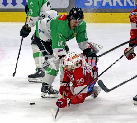 Eishockey ICE Bundesliga. KAC gegen Olimpija Ljubljana. Mario Kempe  (KAC),  Clayton Kirichenko (Olimpija Ljubljana). Klagenfurt, am 26.10.2025
Foto: Kuess
---
pressefotos, pressefotografie, kuess, qs, qspictures, sport, bild, bilder, bilddatenbank