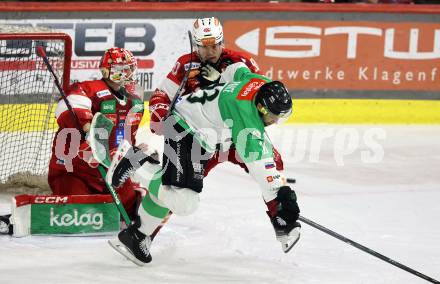 Eishockey ICE Bundesliga. KAC gegen Olimpija Ljubljana.  Matthew Fraser (KAC),  Ziga Pance (Olimpija Ljubljana). Klagenfurt, am 26.10.2025
Foto: Kuess
---
pressefotos, pressefotografie, kuess, qs, qspictures, sport, bild, bilder, bilddatenbank