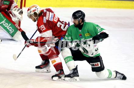 Eishockey ICE Bundesliga. KAC gegen Olimpija Ljubljana.  Mario Kempe (KAC), Alex Petan  (Olimpija Ljubljana). Klagenfurt, am 26.10.2025
Foto: Kuess
---
pressefotos, pressefotografie, kuess, qs, qspictures, sport, bild, bilder, bilddatenbank